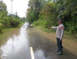 Personil piket laksanakan pengecekan daerah rawan banjir