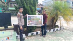 Personel Polsek Mempawah Hulu mengajak masyarakat untuk mensukseskan program ketahanan pangan nasional melalui kegiatan penanaman jagung