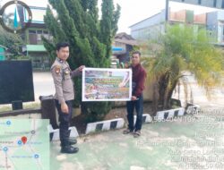 Personel Polsek Mempawah Hulu mengajak masyarakat untuk mensukseskan program ketahanan pangan nasional melalui kegiatan penanaman jagung