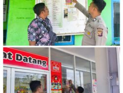 Polsek Nanga Mahap Pasang Stiker Layanan 110 di Sejumlah Titik Publik