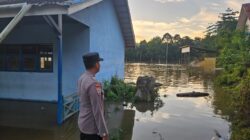 Polsek Menukung Himbau Warga Waspada Banjir