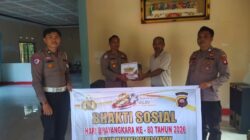 Hari Bhayangkara Ke-80, Polsek Menyuke Bagikan Paket Sembako kepada  Warga