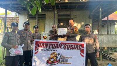 Kapolsek Simpang Dua Salurkan Bantuan Sosial kepada Masyarakat dalam Rangka Hari Bhayangkara ke-80